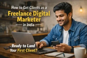 Freelance digital marketer working on a laptop and smartphone with blog title “How to Get Clients as a Freelance Digital Marketer in India” displayed on the screen.